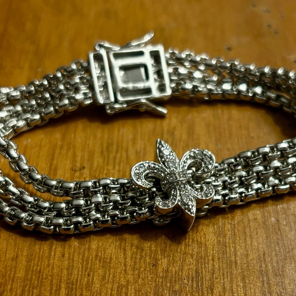 Intricate Silver Bracelet with Double-Strand Chain and Floral Centerpiece
